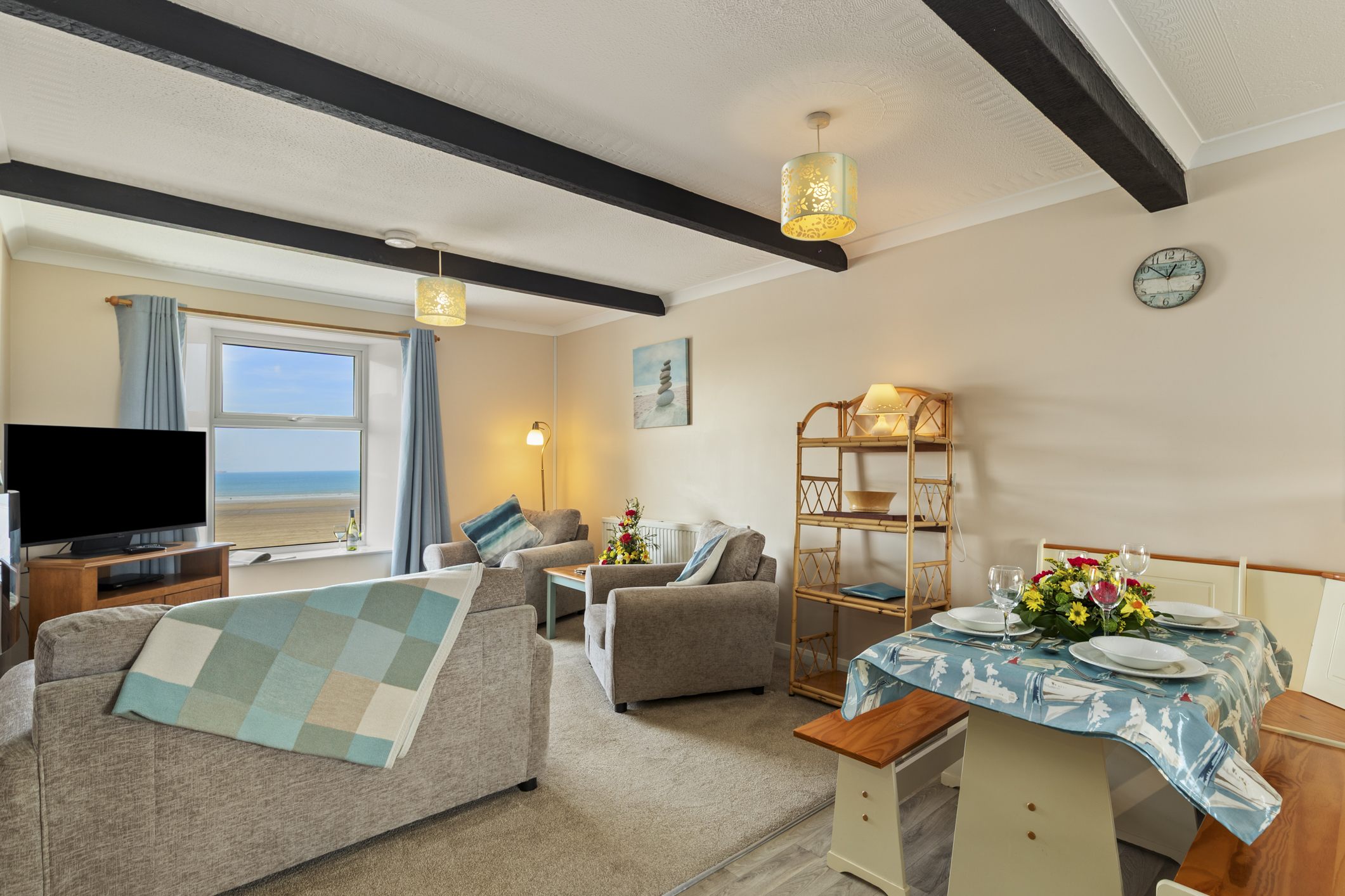Open-plan living and dinning room with sea view in Seaview Apartment 4, Broad Haven