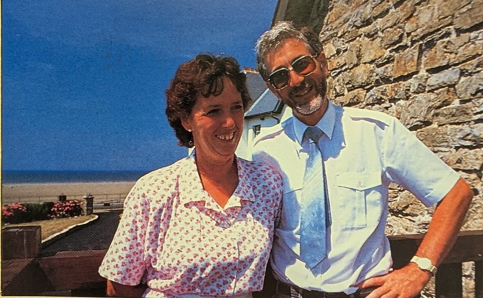 Eric and Helen Mock standing by the seafront in Broad Haven, Pembrokeshire.
